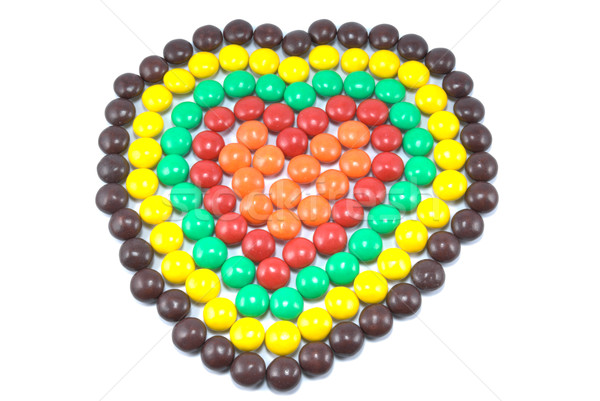 Sweets in multi-coloured chocolate glaze in the form of heart Stock photo © nemalo