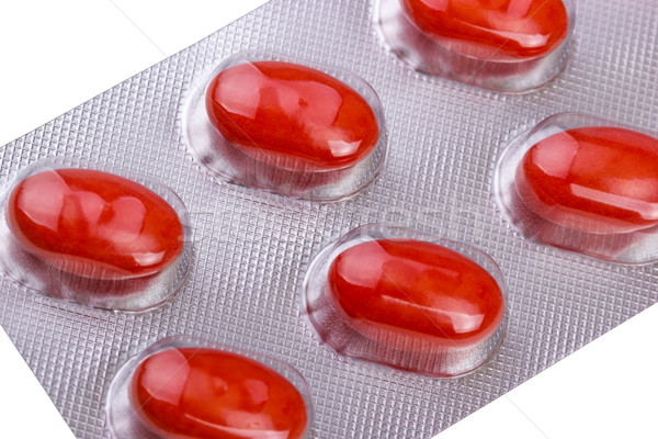 Gyógyszer tabletták izolált fehér orvosi piros Stock fotó © nemalo