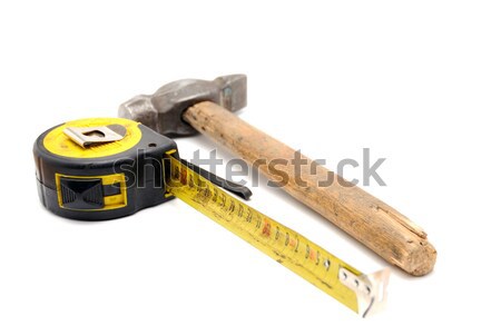 Work tool series: Old tape measure and hammer Stock photo © nemalo