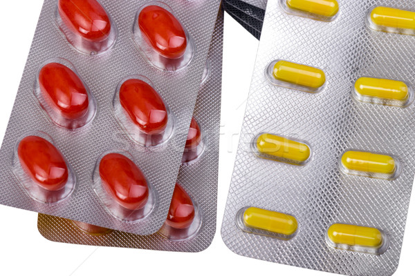 Medicine pills and capsules packed in blisters Stock photo © nemalo