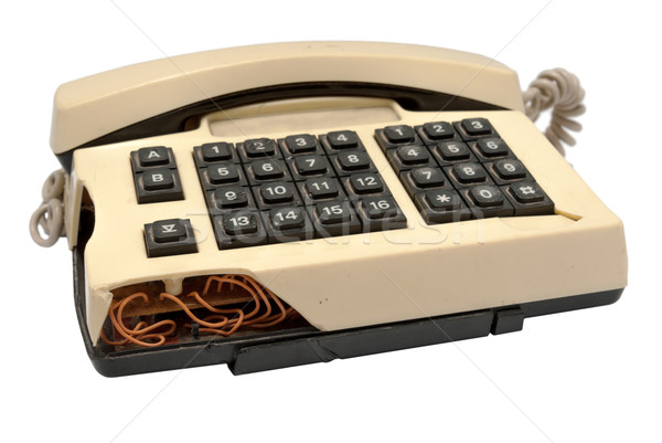 Telephone collection - crashed phone on white background Stock photo © nemalo