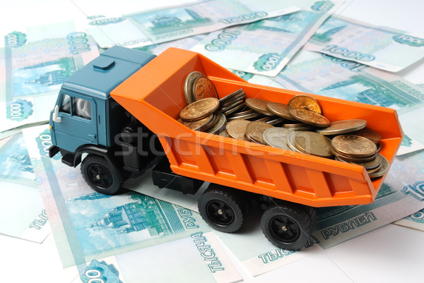 Taşımacılık para küçük madeni para oyuncak kamyon Stok fotoğraf © nemalo