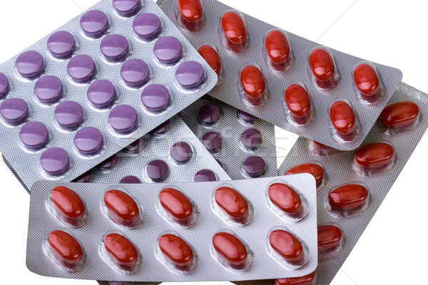 Gyógyszer tabletták izolált fehér háttér segítség Stock fotó © nemalo
