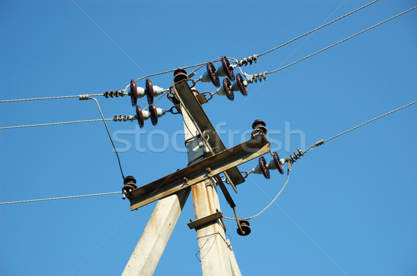 Ferro-concrete column with electric wires. Stock photo © nemalo