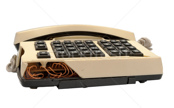 Telephone collection - crashed phone on white background Stock photo © nemalo