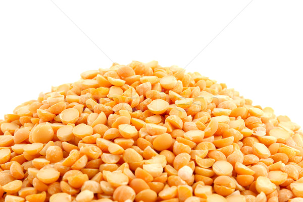 Pile of yellow split peas on white Stock photo © nemalo