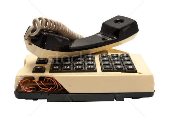 Telephone collection - crashed phone on white background Stock photo © nemalo