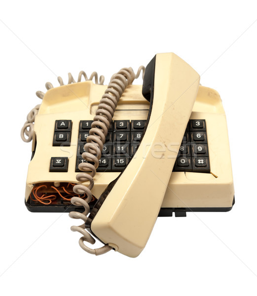 Telephone collection - crashed phone on white background Stock photo © nemalo