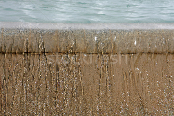 Fountain drops of pure brilliant water brown background Stock photo © nemar974