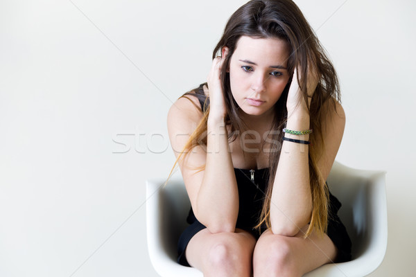 Depressief jonge vrouw vergadering home portret vrouw Stockfoto © nenetus