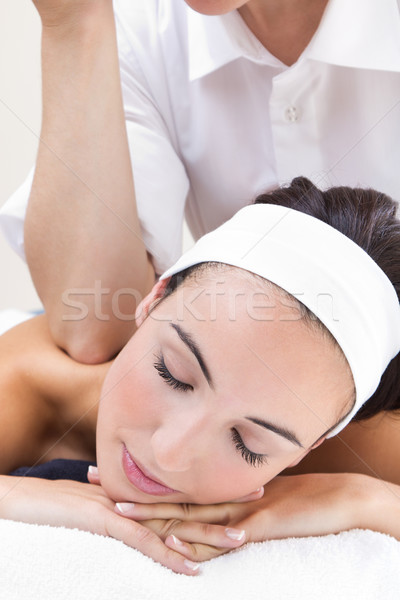 Woman enjoying shoulder massage at beauty spa Stock photo © nenetus