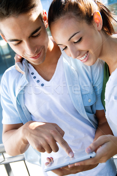 young couple using a digital tablet Stock photo © nenetus