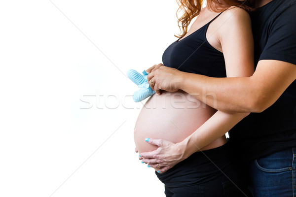 Young couple expecting baby. Isolated on white. Stock photo © nenetus