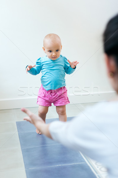 Baby girl learning to walk at home Stock photo © nenetus