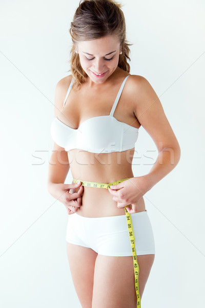 Foto stock: Mulher · jovem · cintura · fita · métrica · retrato · mulher