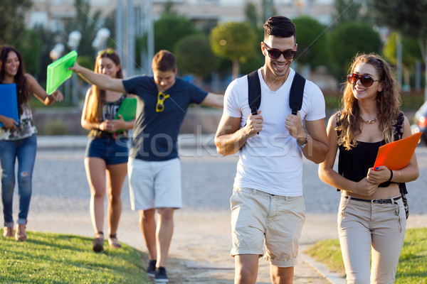 A group of friends talking in the street after class  Stock photo © nenetus