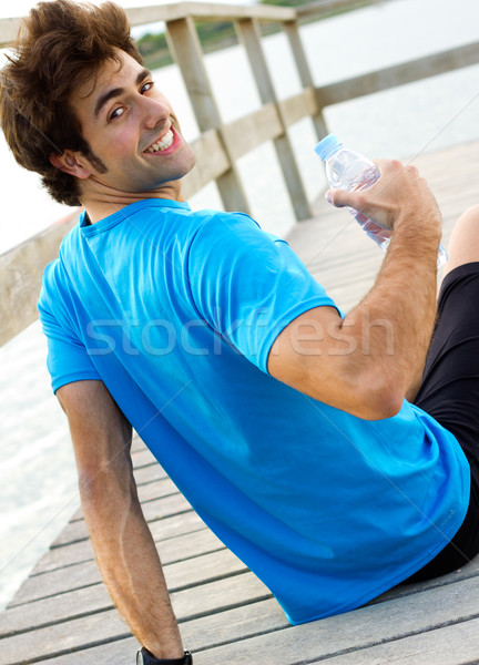 Mann Trinkwasser Sport Aktivitäten junger Mann Natur Stock foto © nenetus