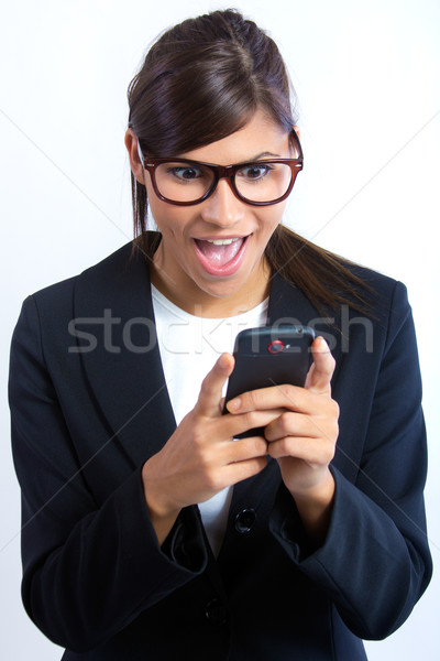 beautiful brunette woman looking the mobile Stock photo © nenetus