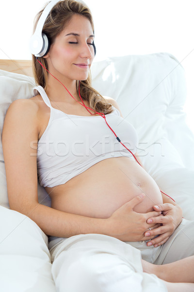 Foto stock: Mujer · embarazada · sesión · sofá · casa · escuchar · música