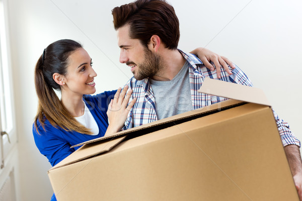 Young couple moving in new home  Stock photo © nenetus