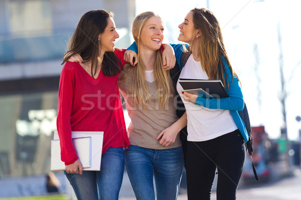 Friends talking in the street after class Stock photo © nenetus