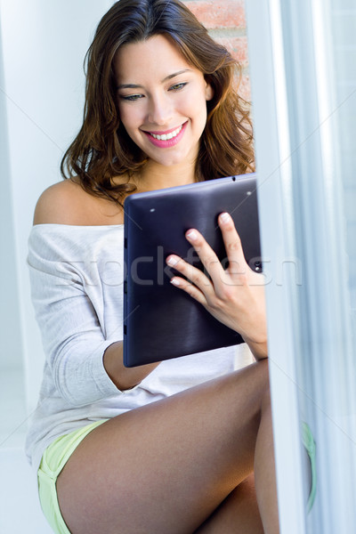 woman with tablet at home Stock photo © nenetus