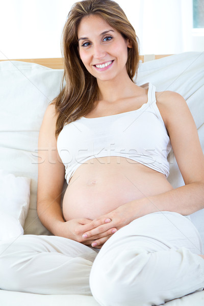 Pregnant woman relaxing at home. Stock photo © nenetus