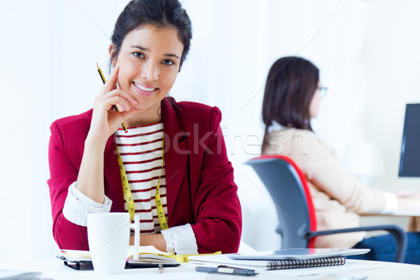 Two young businesswomen working in her office. Stock photo © nenetus