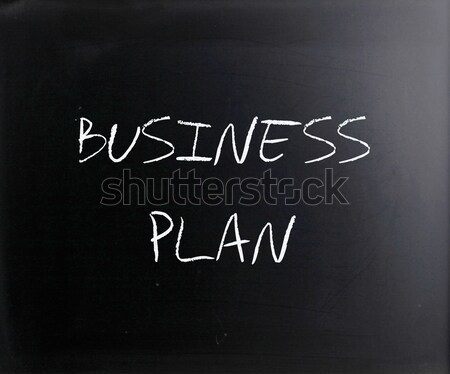 'Business plan' handwritten with white chalk on a blackboard Stock photo © nenovbrothers