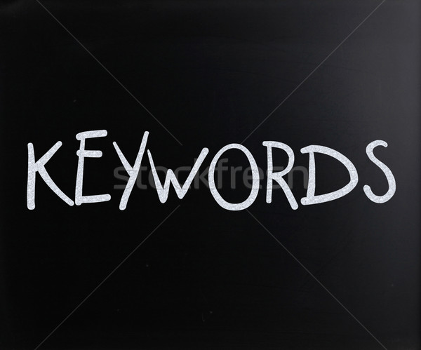 The word 'Keywords' handwritten with white chalk on a blackboard Stock photo © nenovbrothers