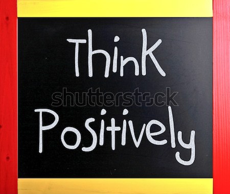 'Think Positively' handwritten with white chalk on a blackboard Stock photo © nenovbrothers