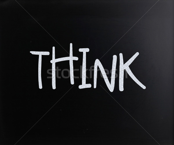 The word 'Think' handwritten with white chalk on a blackboard Stock photo © nenovbrothers