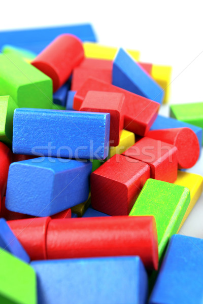 Bois blocs de construction fond bleu bâtiments rouge [[stock_photo]] © nenovbrothers