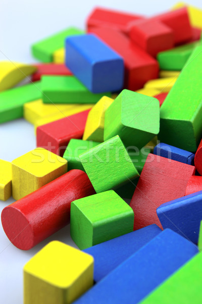 Bois blocs de construction fond bleu bâtiments rouge [[stock_photo]] © nenovbrothers