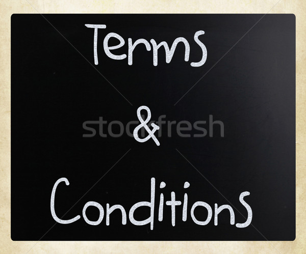 'Terms & Conditions' handwritten with white chalk on a blackboar Stock photo © nenovbrothers