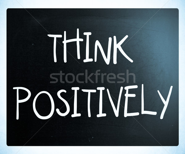 'Think Positively' handwritten with white chalk on a blackboard Stock photo © nenovbrothers