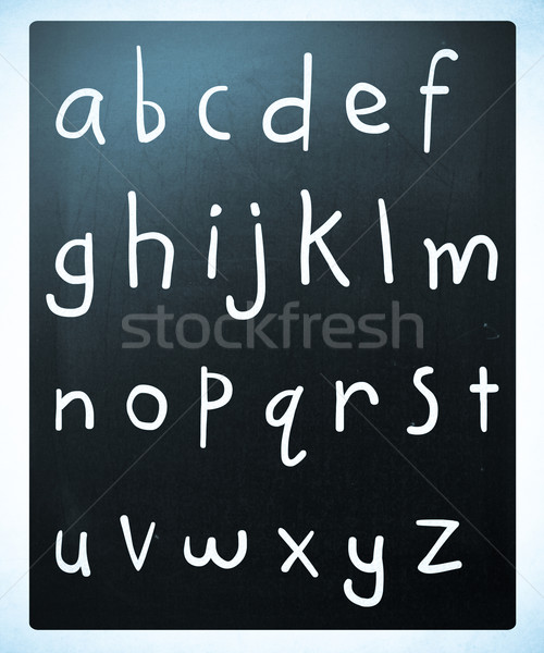 Complete english alphabet handwritten with white chalk on a blac Stock photo © nenovbrothers