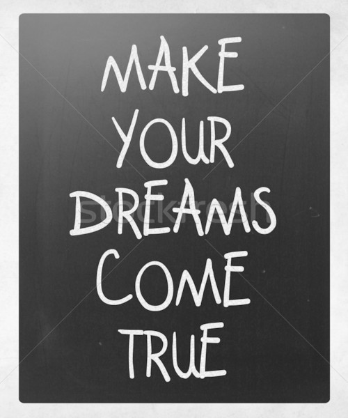 'Make your dreams come true' handwritten with white chalk on a b Stock photo © nenovbrothers
