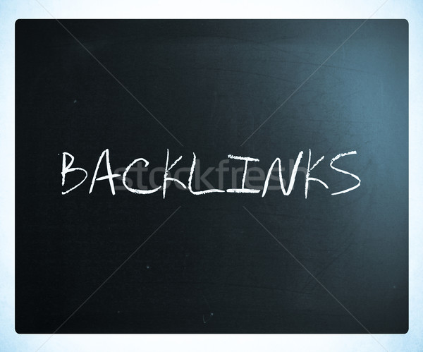 The word 'Backlinks' handwritten with white chalk on a blackboar Stock photo © nenovbrothers