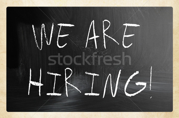 'We are hiring!' handwritten with white chalk on a blackboard Stock photo © nenovbrothers