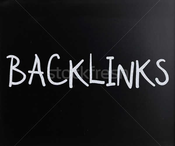 The word 'Backlinks' handwritten with white chalk on a blackboar Stock photo © nenovbrothers
