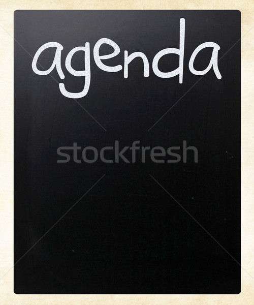 'AGENDA' handwritten with white chalk on a blackboard Stock photo © nenovbrothers