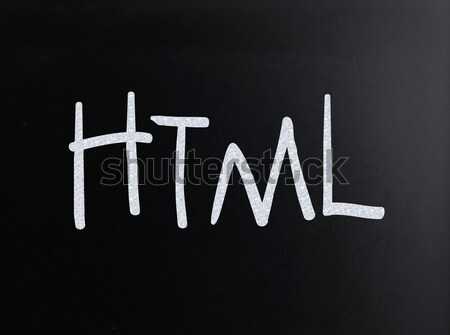 The word 'HTML' handwritten with white chalk on a blackboard Stock photo © nenovbrothers