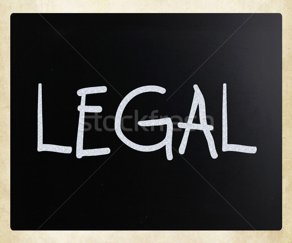 The word 'Legal' handwritten with white chalk on a blackboard Stock photo © nenovbrothers