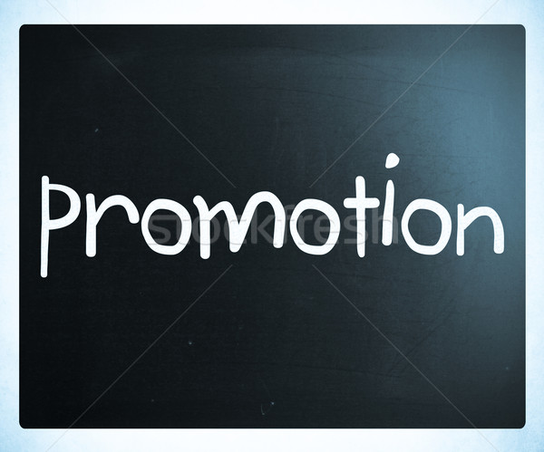 The word 'promotion' handwritten with white chalk on a blackboar Stock photo © nenovbrothers