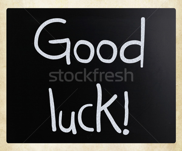 'Good luck!' handwritten with white chalk on a blackboard Stock photo © nenovbrothers