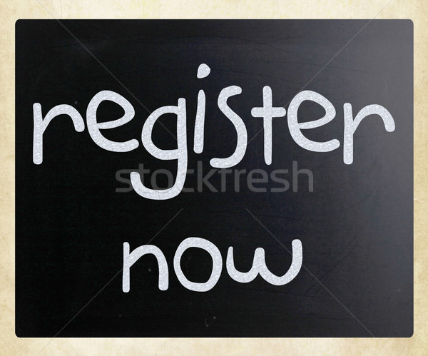 'Register now' handwritten with white chalk on a blackboard Stock photo © nenovbrothers