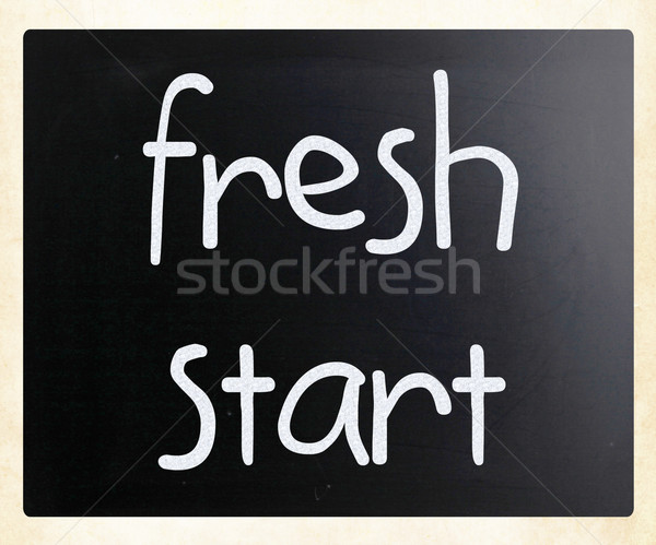 'fresh start' handwritten with white chalk on a blackboard Stock photo © nenovbrothers