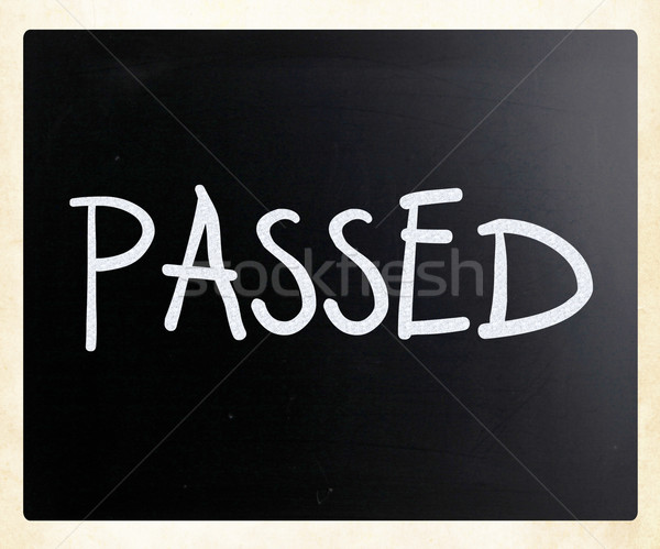 'Passed' handwritten with white chalk on a blackboard Stock photo © nenovbrothers