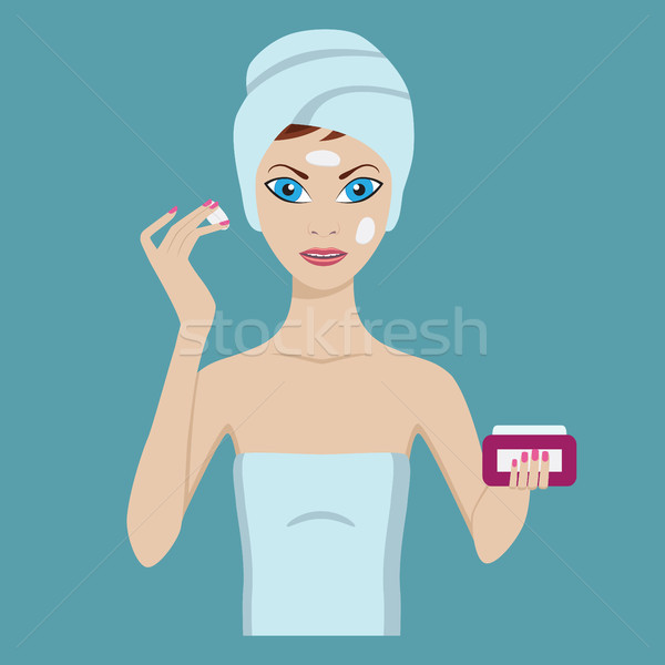 Young woman care her face using cream. Stock photo © Neokryuger